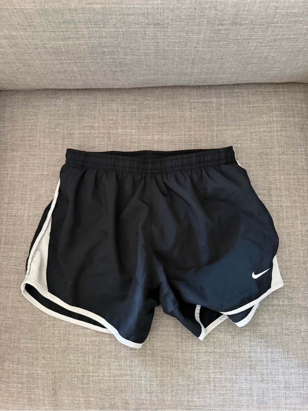 Nike Women's Black Athletic Shorts with White Trim and Swoosh